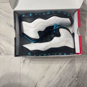 This is a pair of Air Jordan 10 Retro Powder Blue 2014 sneakers.